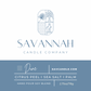 A clean product label card for Savannah Candle Company, showing the brand name and logo at the top and product details for 'Dune' soy blend candle below on a blue background. Fragrance is citrus peel, sea salt, and palm 