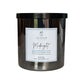 A Savannah Candle Co. jar candle in a dark metallic container with a black lid and a white label reading 'Midnight Bergamot | Amber | Musk'.