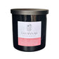 Black candle with a label from Savannah Candle Company on a white background.  Rose fragrance.
